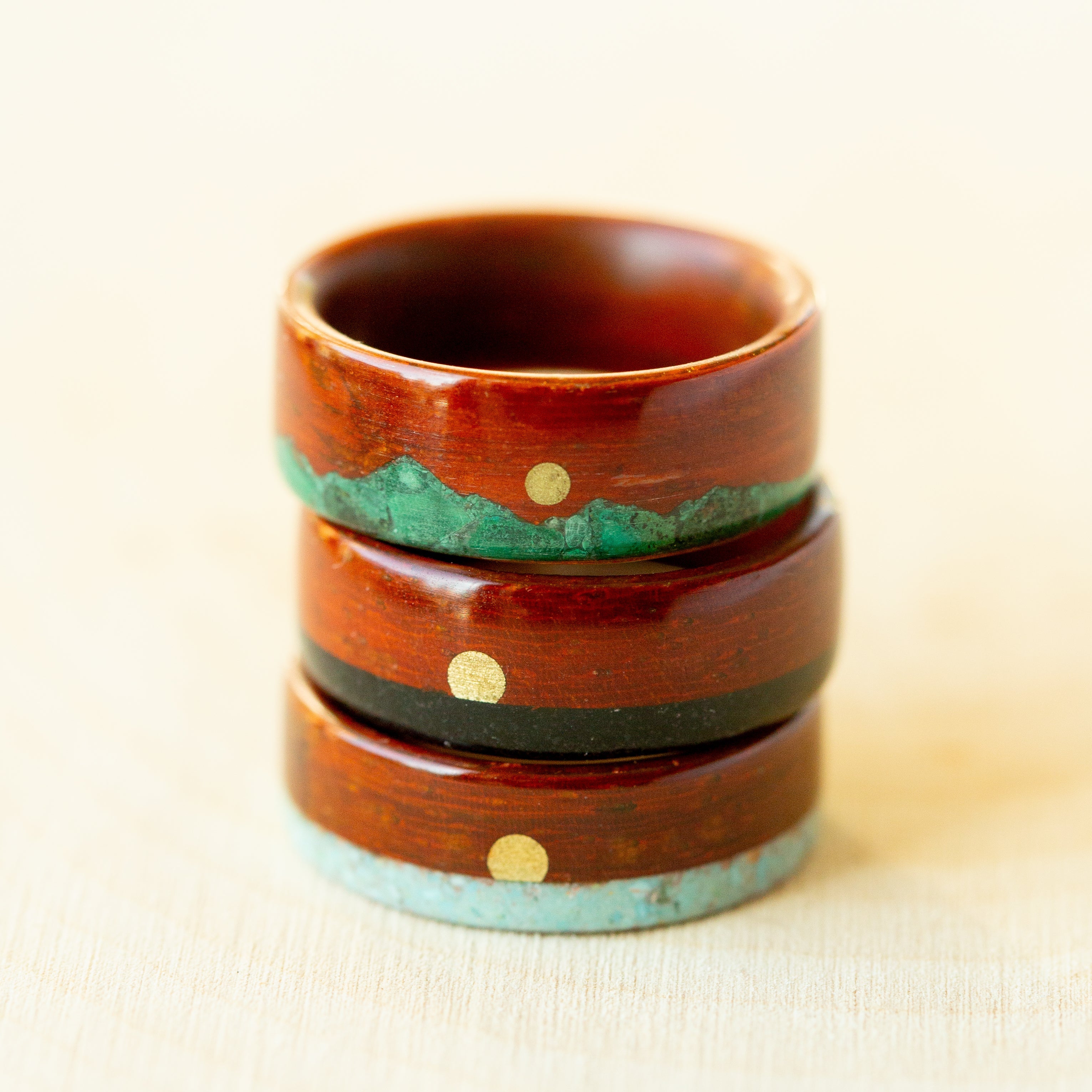 red wooden rings stacked