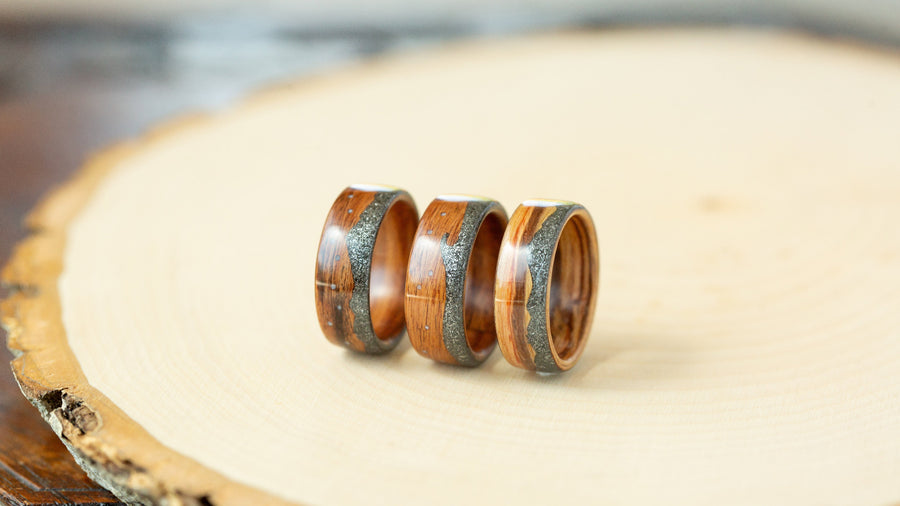 Three wooden rings with meteorite inlay