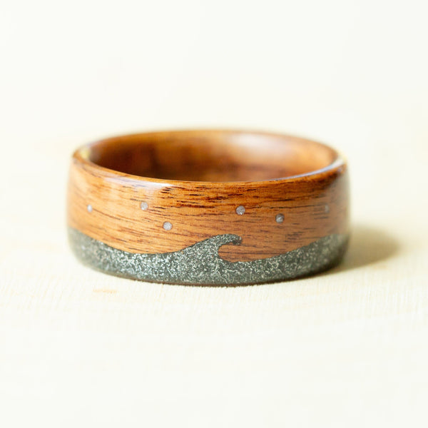 Wooden ring with a wave design on a white background