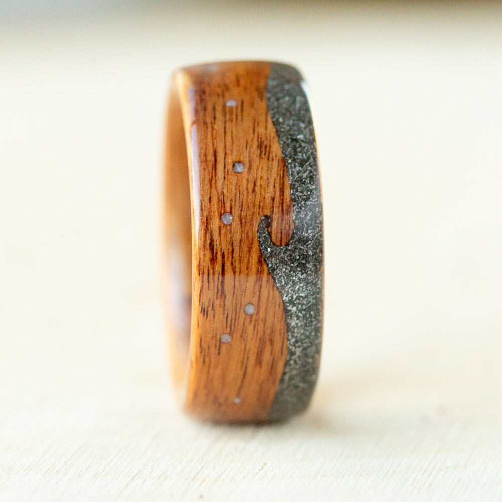 Wooden ring with a wave design on a white background
