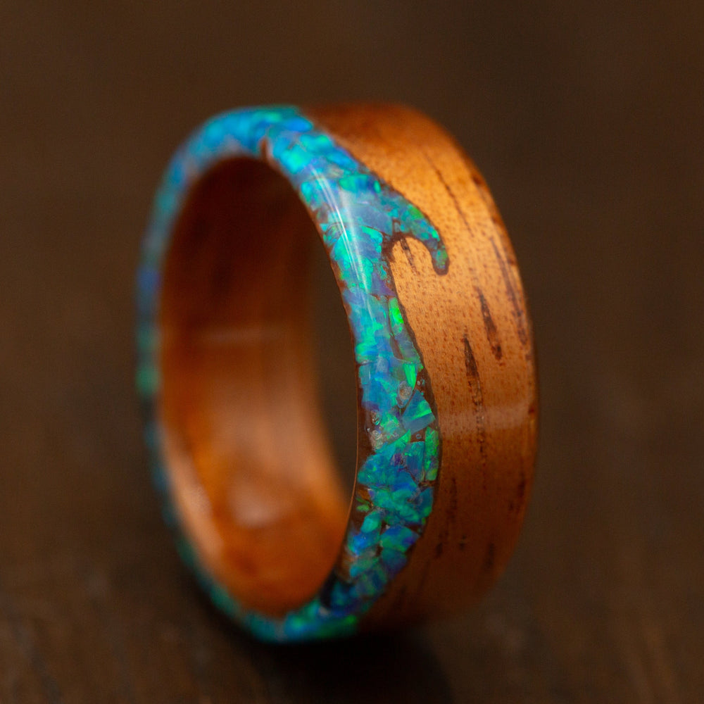 Wooden ring with blue opal inlay 
