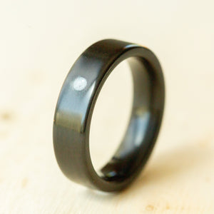 Mother of Pearl Sun on Carbon Fiber