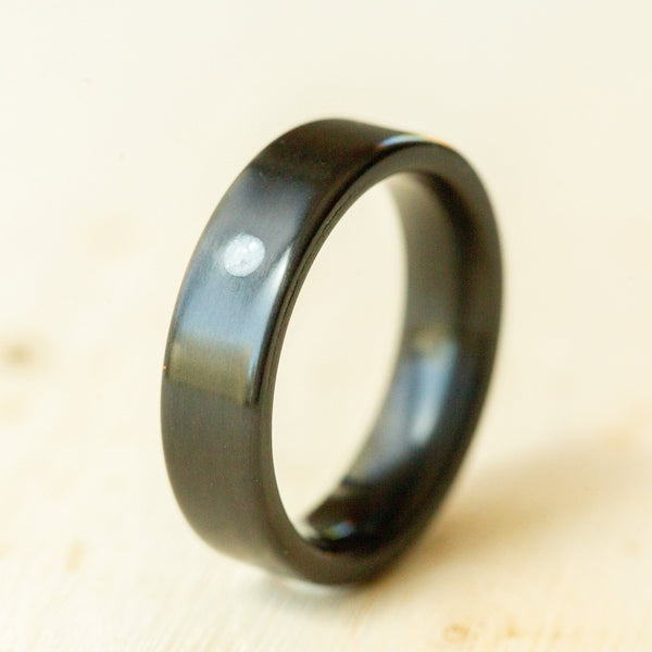 Mother of Pearl Sun on Carbon Fiber