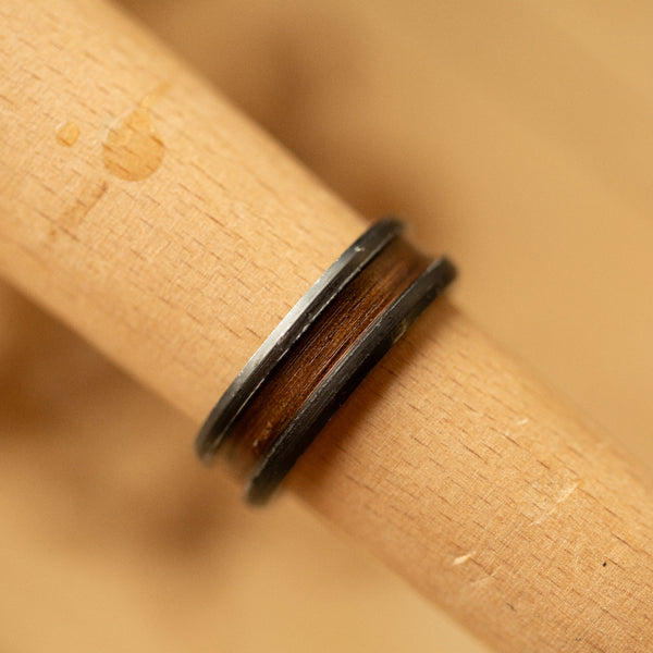 black ceramic ring with wood inlay