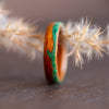 wooden ring with malachite stone