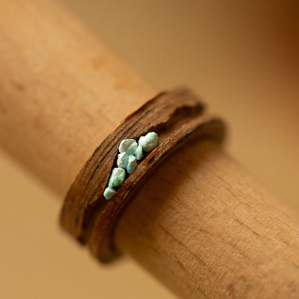 brown wood ring with turquoise