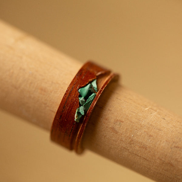 mahogany ring with green stone