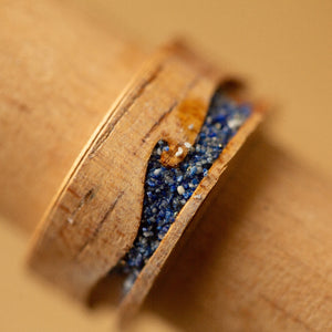 wood ring with wave design and lapis lazuli
