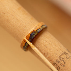 mountain design on wood ring with lavender inlay
